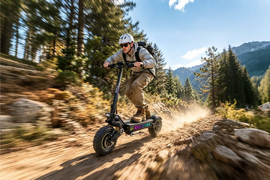 Male rider wearing white helmet and backpack speeding on heavy-duty off-road e-scooter with colorful deck lights, kicking up dust on rocky mountain dirt trail surrounded by pine trees, outdoor mountain adventure