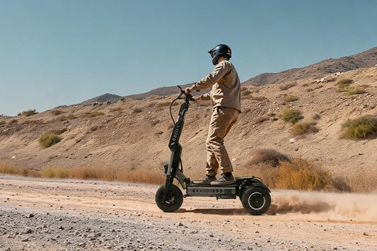 T30 dual motor off-road electric scooter kicking up dust on rocky mountain trail